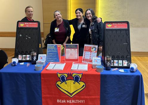 Staff from Watkins Health Center at their table